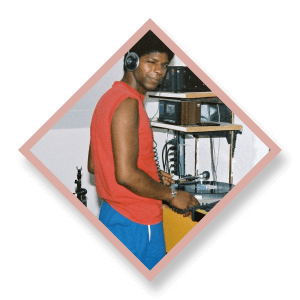 a man in a red shirt is wearing headphones